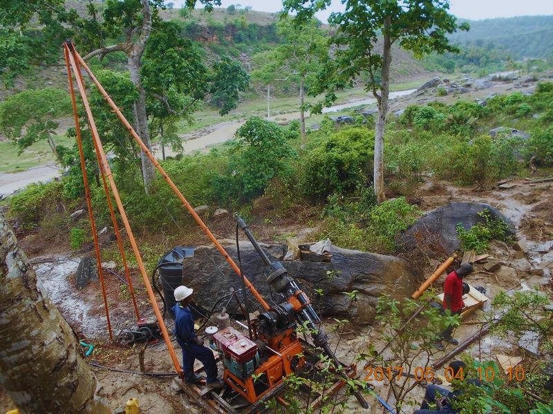Core drilling on a terraced highland slope